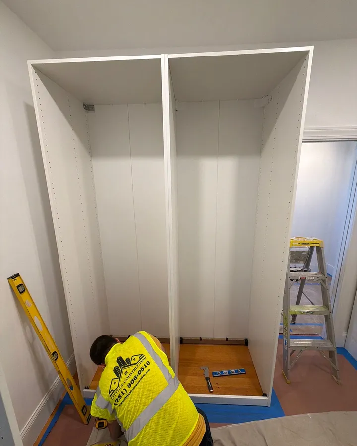 During: our carpenter installing the closet system