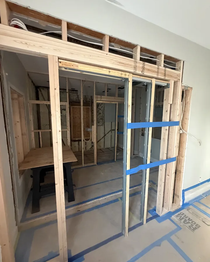 During: new walls framed for the bath and walk-in closet
