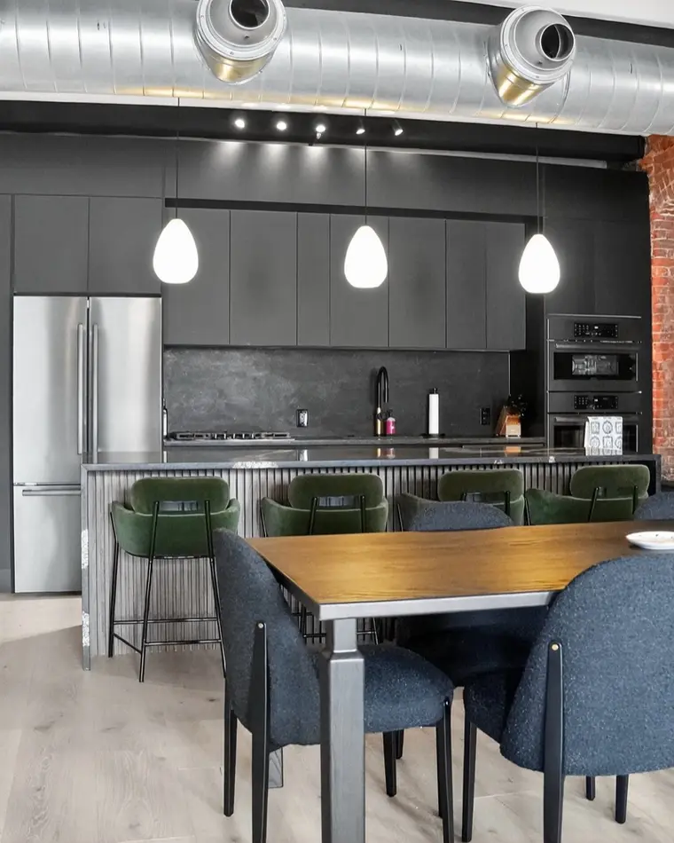 Kitchen and dining under exposed ducts, Seaport