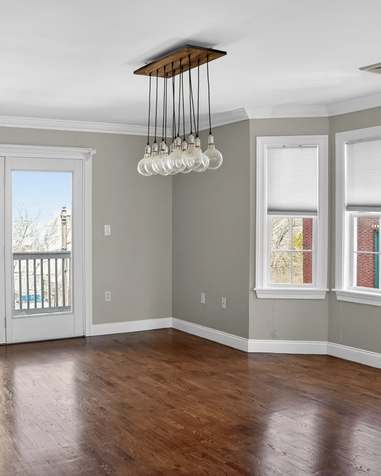 Dining room under a glass pendant, South Boston