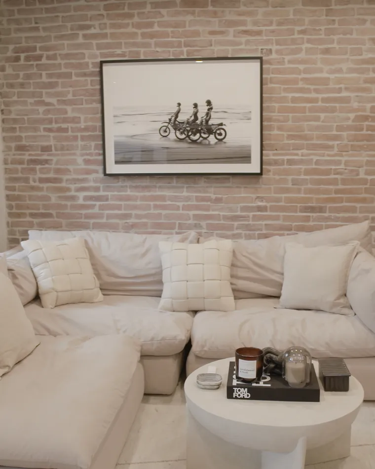 Living room against the brick, South End